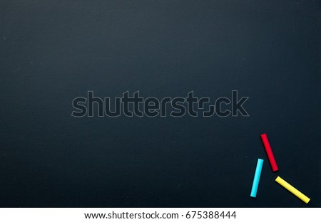 Empty chalkboard texture with colorful chalks,. image for background, wallpaper and copyspace. bill board wood frame for add text.