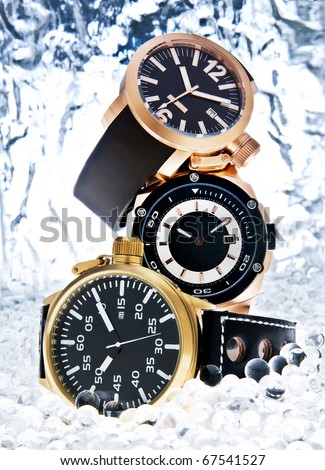 watches on a icy abstract background Royalty-Free Stock Photo #67541527