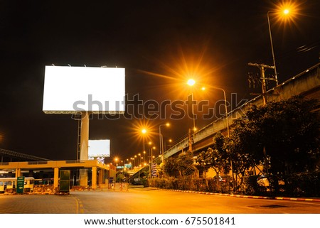 Blank big billboard night background for your advertising,put your own text here,isolate white on board