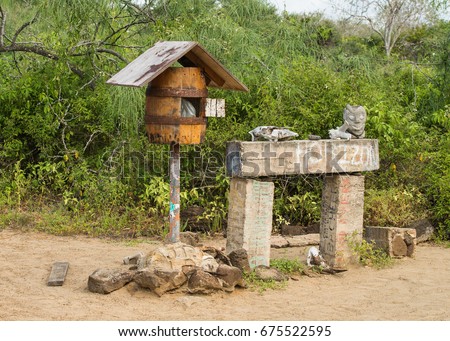 mail box in post office bay, Floreana Island, Galapagos Royalty-Free Stock Photo #675522595