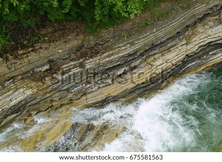 A mountain river with rocky shores