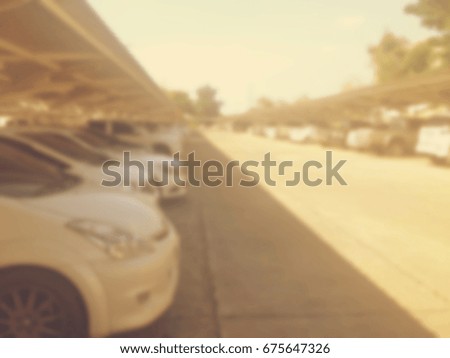 Abstract blur cars parking with bokeh light Background