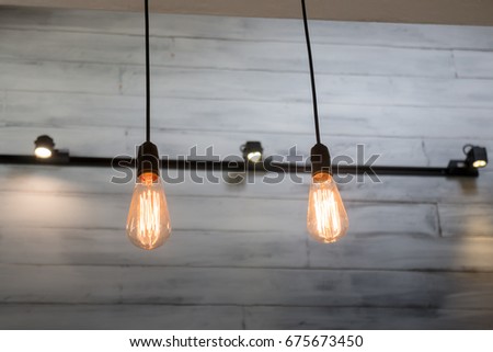 Vintage bulbs on wall background, stock photo
