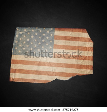 Old Usa flag on black. Vintage photo