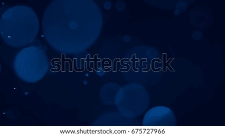 dark blue bubble bokeh abstract background