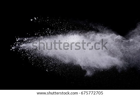 Abstract powder explosion isolated on black background