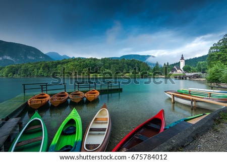 Colorful kayaks at lake Bohinj, Slovenia.