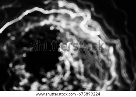 Light painting art black and white photo abstract background 