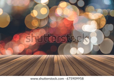 wooden floor and blurred bokeh in background space for your text or object in photo.