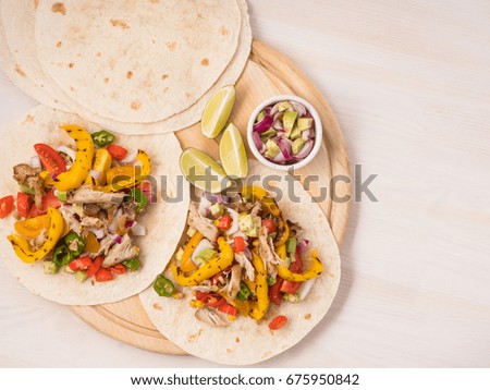 Tacos on pita, rustic wooden white background. Recipe traditional food. Big size resolution photo. Flat top view.