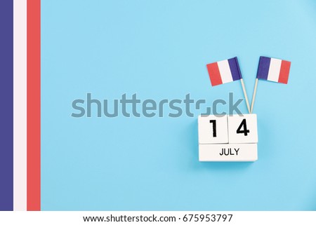 14 july Wooden calendar and Happy Bastille Day. Concept National Day France,independence day of France,Copy space,minimal style