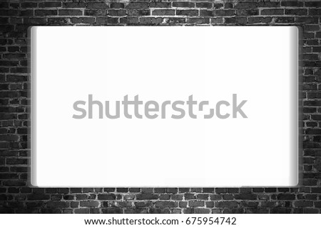 Horizontal blank posters hanging on the brick black wall of broken painted brick, mock up