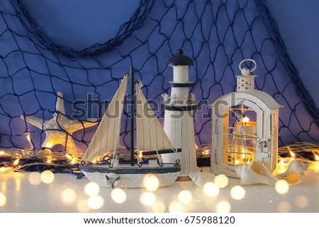 Magical lantern with candle light and wooden boat on the shelf. Nautical concept.