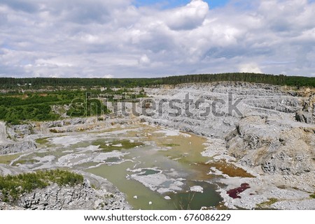 Old granite quarry current. Ekaterinburg, Sverdlovsk oblast, Russia.