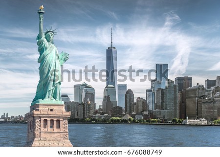 The statue of Liberty with World Trade Center background, Landmarks of New York City Royalty-Free Stock Photo #676088749