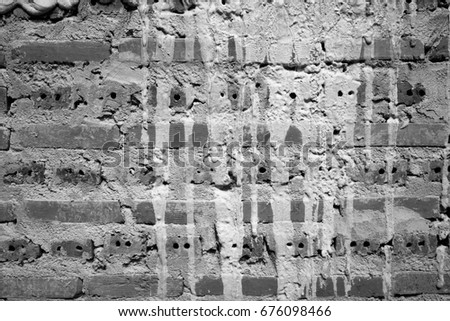 Cement mix red brick wall as construction background - Black and White