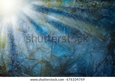 Blue background broken light glass