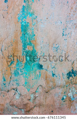 Old weathered concrete wall texture threadbare colored with different colors.