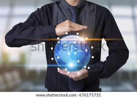 Business hand with application icons interface and globe networking system. concept technology social network communication.