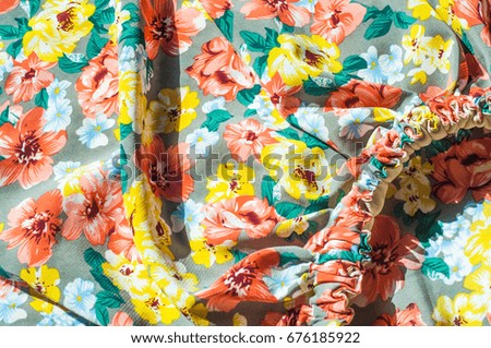 Silk fabric with floral pattern. Red Yellow Flowers