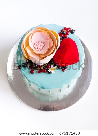 Fruit cake with chocolate velour heart and flower