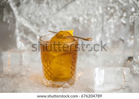 Cocktail in a glass on ice. Bar drinks on a white background. Healthy fresh food.