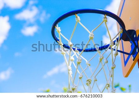 Basketball ring on blue sky background

