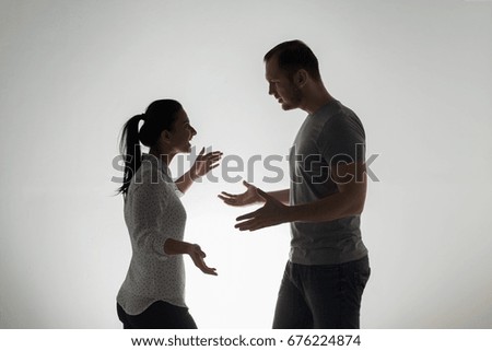 people, relationship difficulties, conflict and family concept - angry couple having argument Royalty-Free Stock Photo #676224874