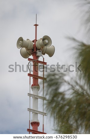 Tsunami siren warning loudspeakers are installed on the beach in Thailand