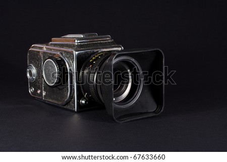 Middle-format camera on black background