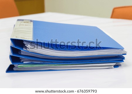 file folder with documents and documents. retention of contracts at the meeting room on the white table