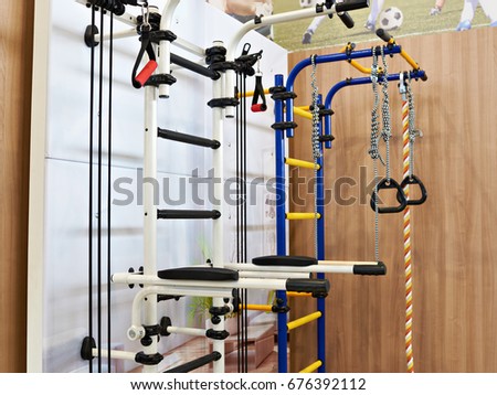 Home sports complex with a horizontal bar, parallel bars and a gymnastics wall bars