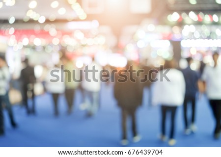 Abstract background blurred many people in the exhibition event. Royalty-Free Stock Photo #676439704