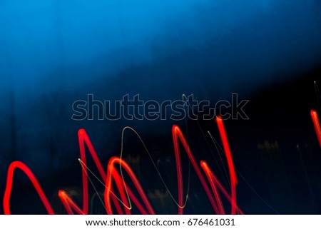 Blurry light effect from small size of multicolor lightbulb on dark background represent the abstract concept related idea.
