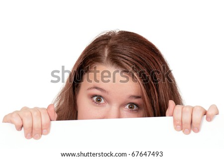 Young beautiful businesswoman holding empty white board