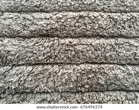 Gray fabric carpet with long pile texture background