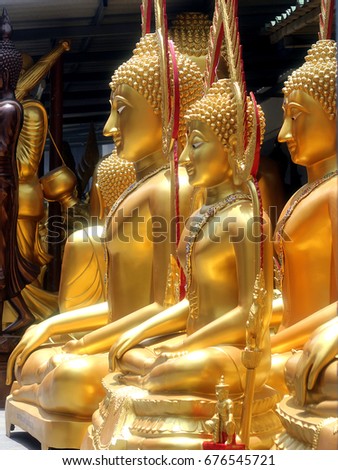 Golden Buddha statues. Bangkok, Thailand.
