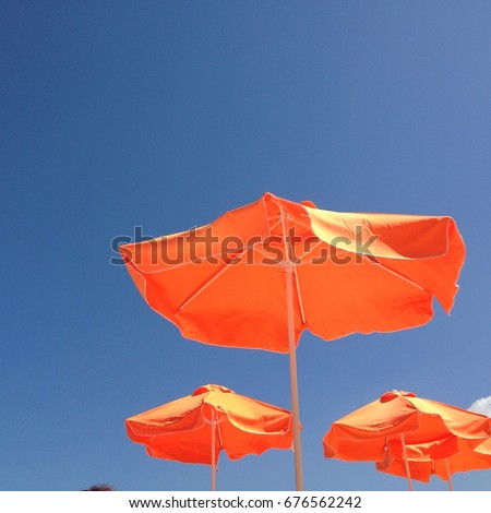 vacation umbrella parasol against sky background with copy space duotone pop art contrast candy minimal  contempory modern style stock, photo, photograph, picture, image