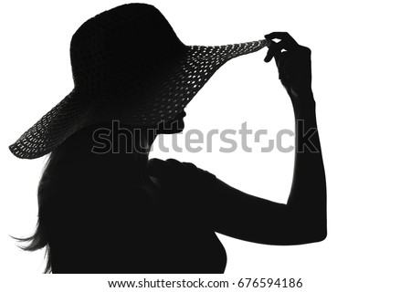 Black and white fashion portrait silhouette of face of a young woman in a hat with wide brim On white isolated background