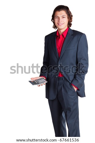 businessman stands and smiling with calculator in right hand in grey suit and red shirt on white background