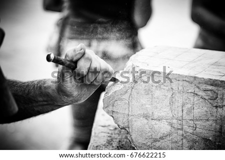 Carving stone, craftsman shaping stone, art and crafts Royalty-Free Stock Photo #676622215