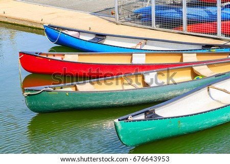 Touring canoes moored at Shadwell Basin in London