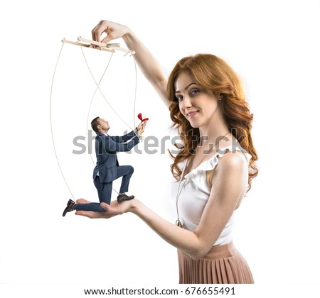 man manipulated by cunning woman to make a proposal isolated on white Royalty-Free Stock Photo #676655491