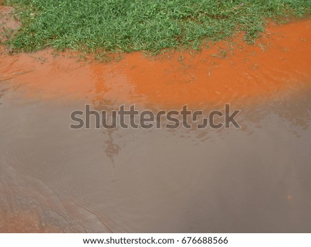 This is a picture of a flooded farmer's garden, caused by heavy rains, along the flowing water route.