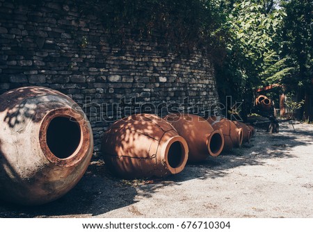 Georgia's Giant Clay Pots Hold An 8000-Year-Old Secret To Great Wine Royalty-Free Stock Photo #676710304