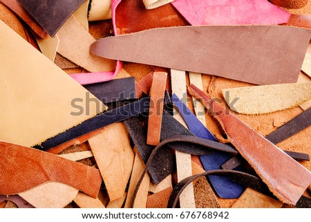 little colored scraps of leather, natural texture background, close up