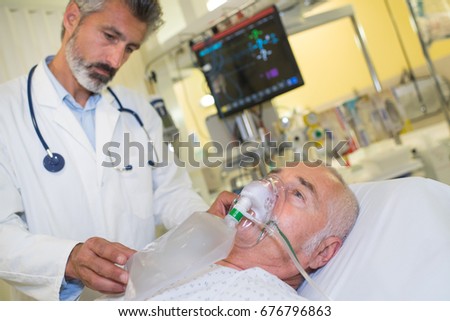 first aid instructor with patient Royalty-Free Stock Photo #676796863