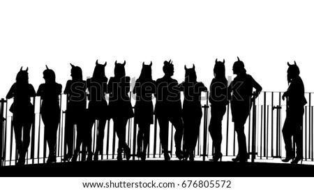 Silhouettes of devil's women standing on a small bridge.