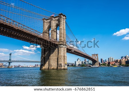The Brooklyn Bridge links Manhattan with the borough it is named after in New York City.