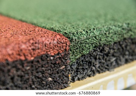 Tile from rubber crumb close up Royalty-Free Stock Photo #676880869